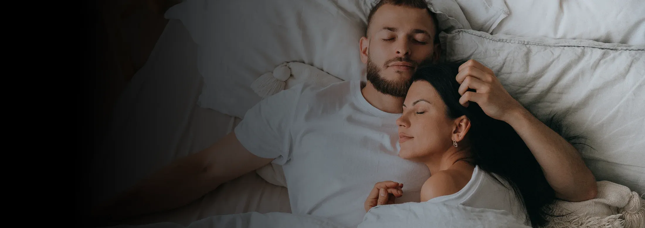 couple sleeping in bed bug free bed